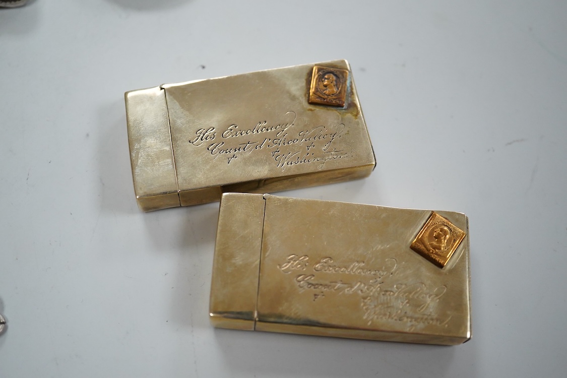 Three assorted silver vesta cases including one with a white metal chain, two gilded 900 standard white metal vesta cases, designed as a letter with postage stamp, 60mm, one 925 vesta case modelled as a satchel and two s